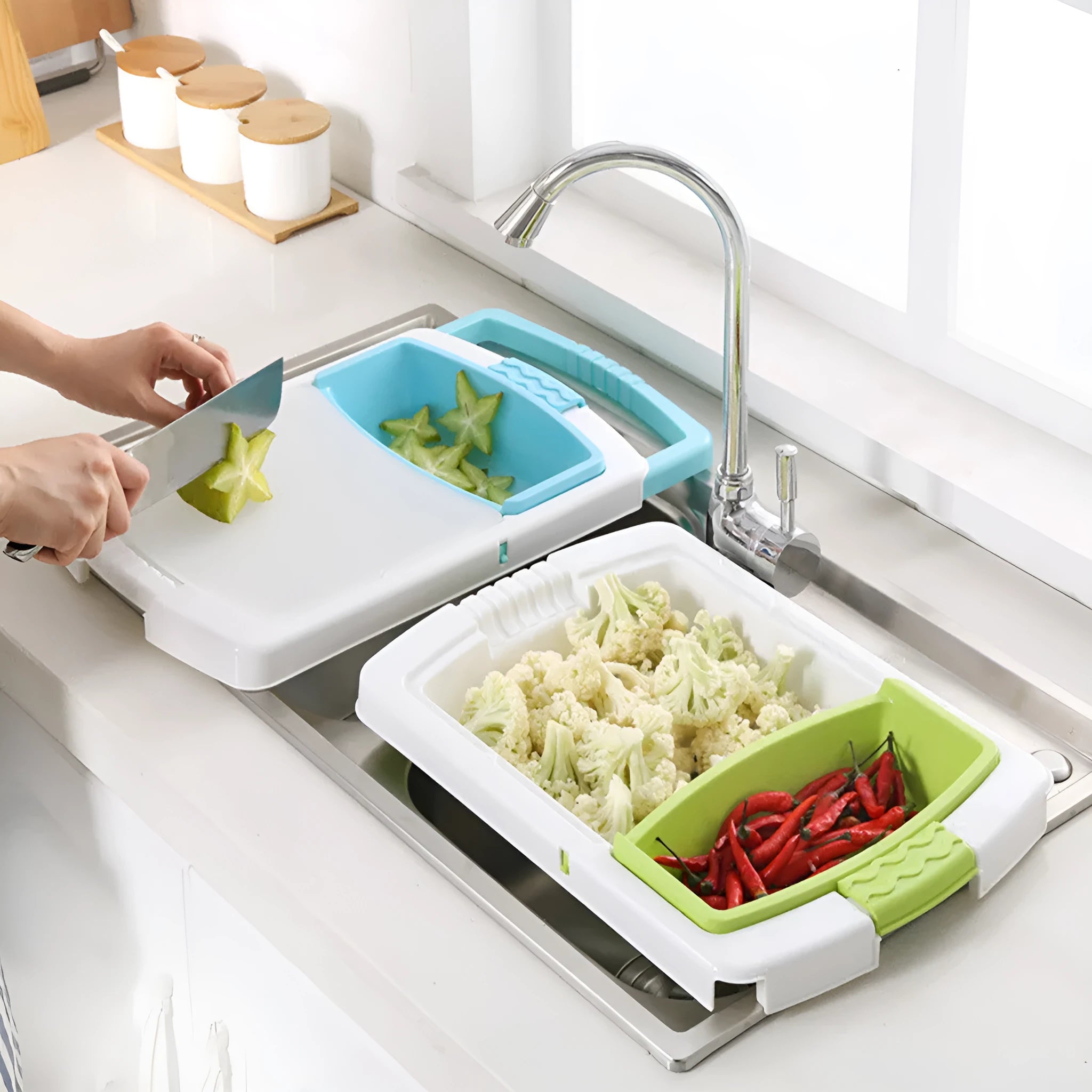 Green multi-function kitchen cutting board with integrated draining basket mounted on sink