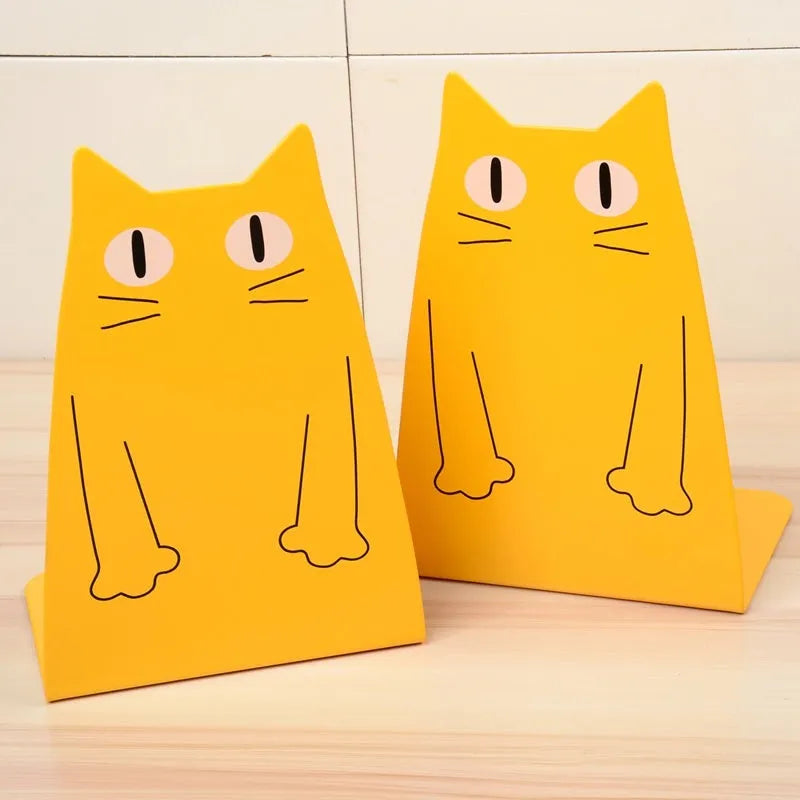 Pair of iron bookends in blue colour, 14 x 20.5 x 10.5cm, holding books upright on a shelf