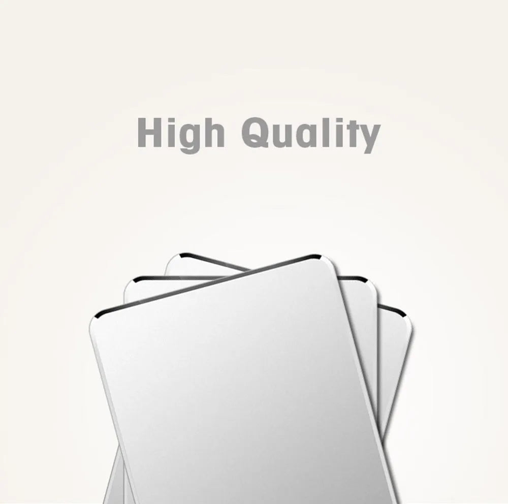 Aluminium alloy double-sided mouse pad in black finish on a desk for gaming or office use