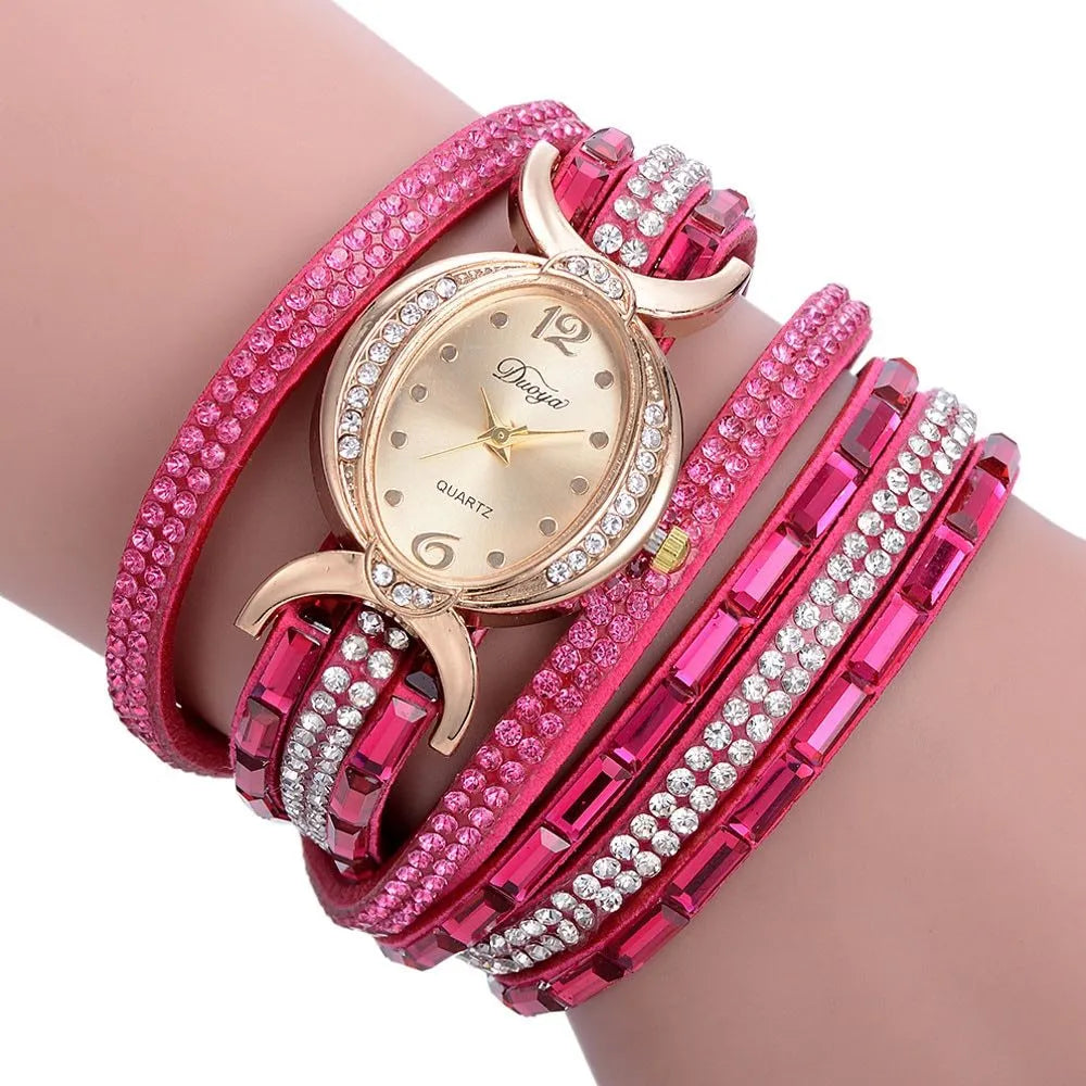 New casual rhinestone watch for women with round stainless steel case, leather band, and analog quartz movement