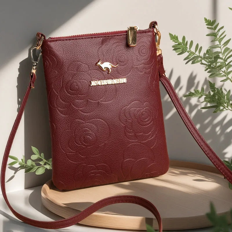 Square black rose pattern PU shoulder messenger bag with file organiser interior and shoulder strap.