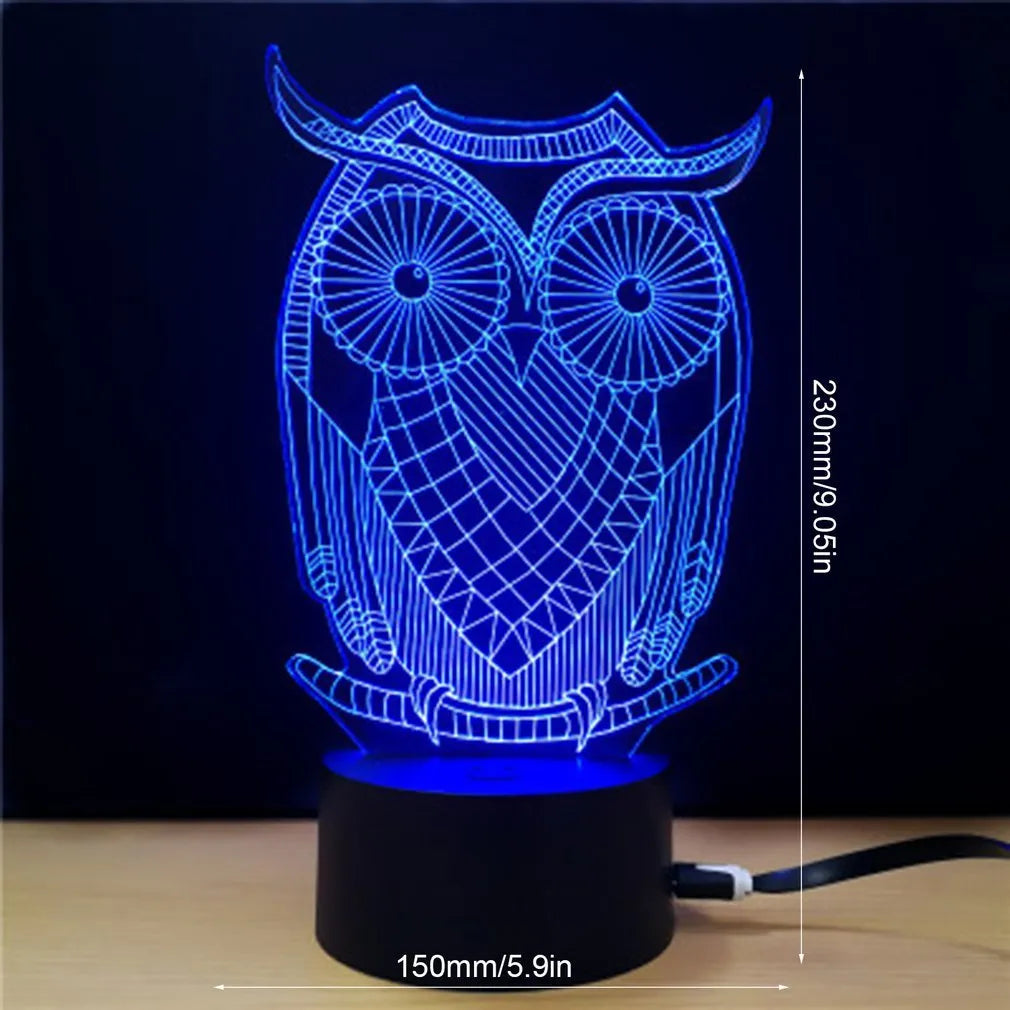 Black LED owl cartoon night light with colourful touch-switch and acrylic shade on a table