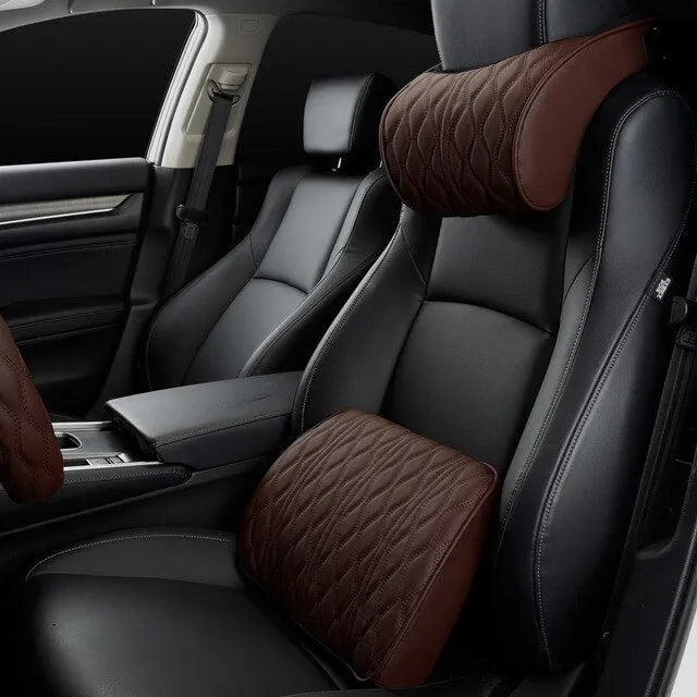 Memory foam car headrest and waist rest set in black leather and knitted fabric on a car seat