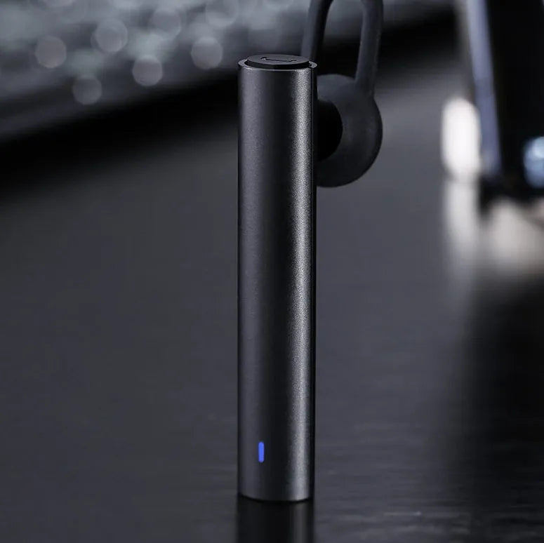 Black and white wireless Bluetooth headset showing compact 5.6cm size with V4.1 Bluetooth technology