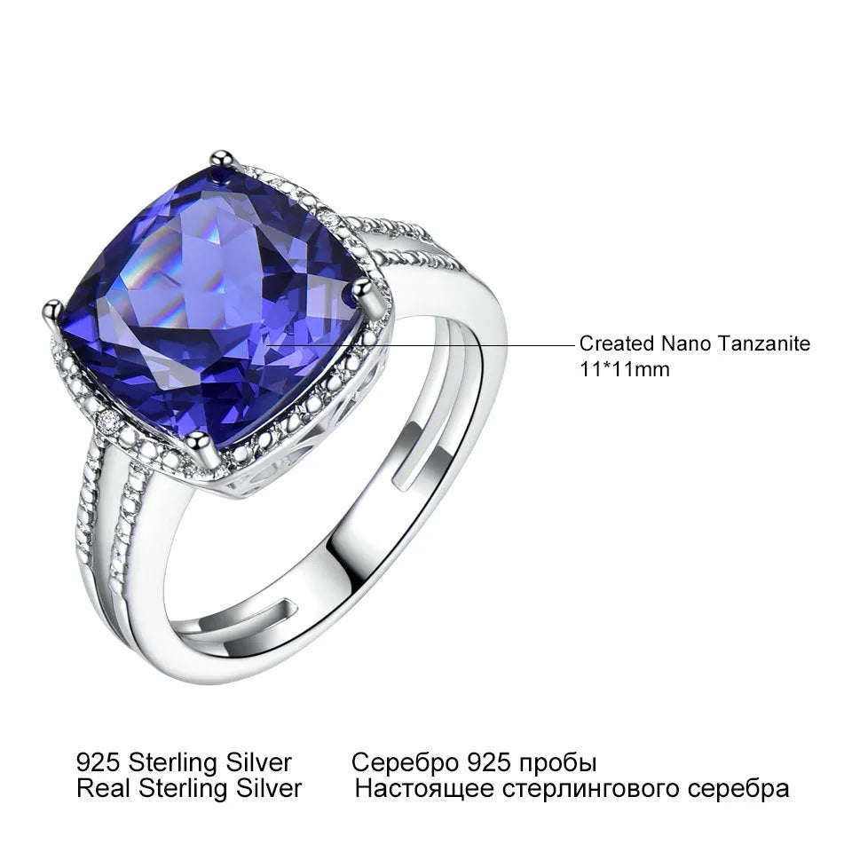 A blue tanzanite stone set in a sterling silver women's ring, showing front detail.