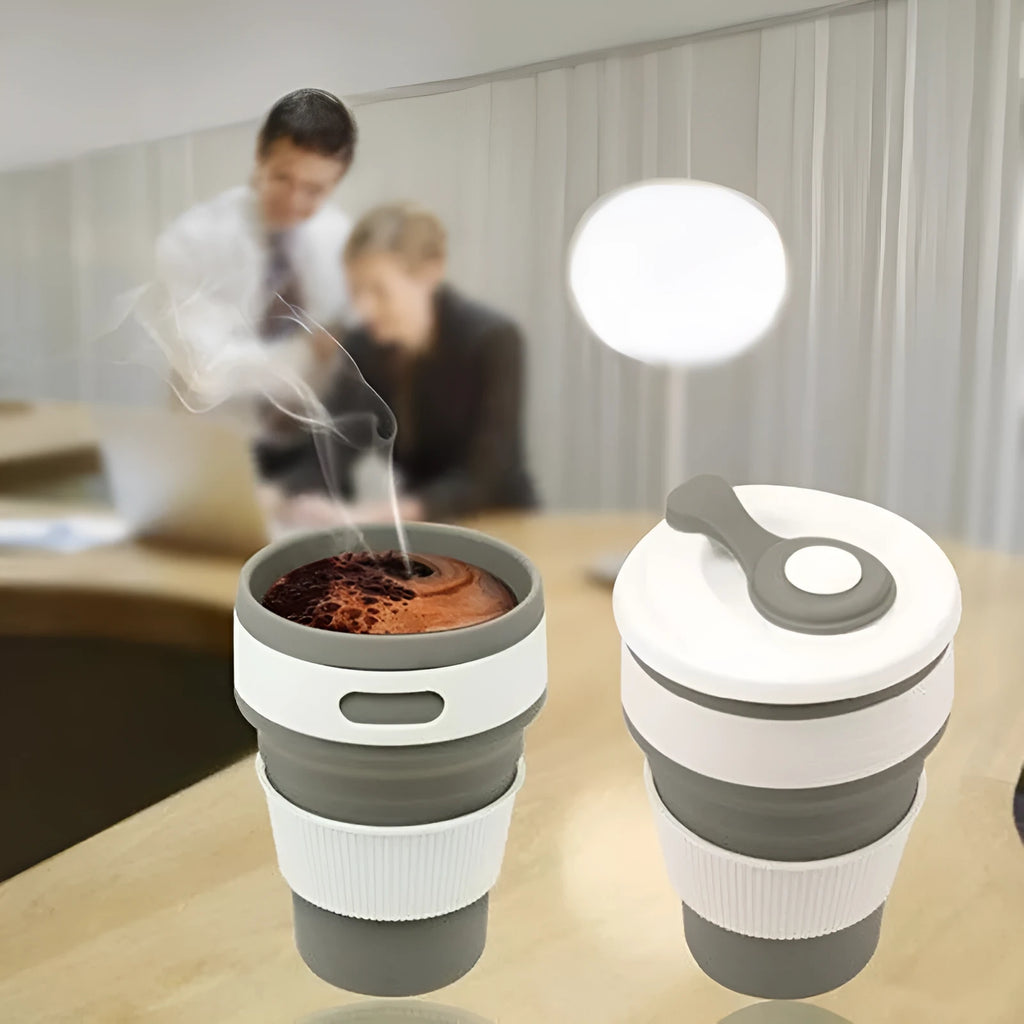 Green collapsible silicone travel mug shown expanded and folded to 6cm height