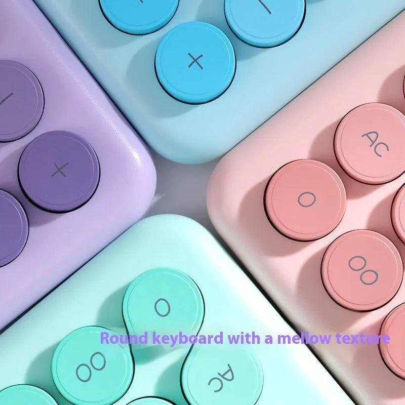 Desk calculator in a choice of violet, cherry blossom powder, glacier blue, and mint green gradient colours.