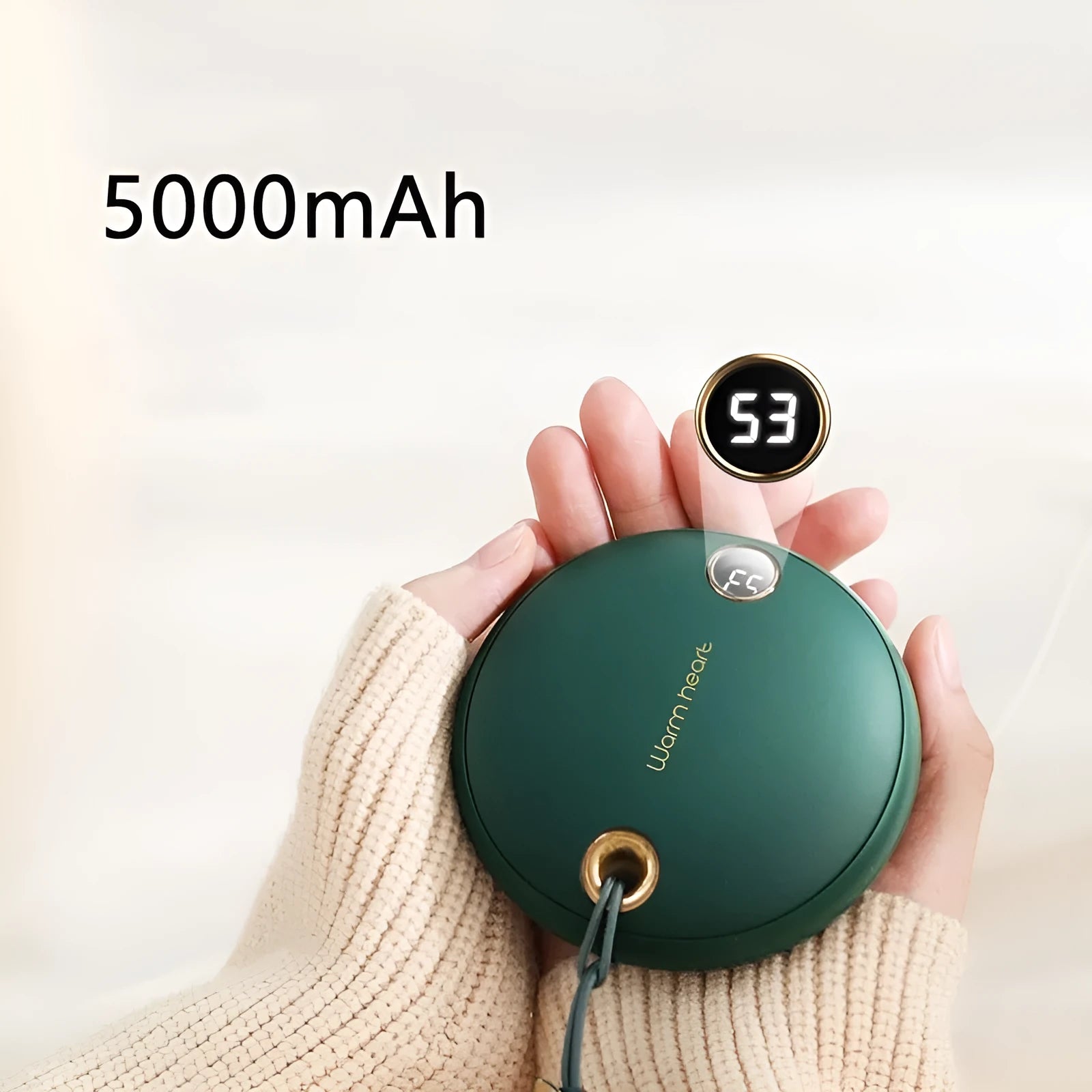 Green, pink or white 5000mAh power bank with digital display and integrated hand warmer function.