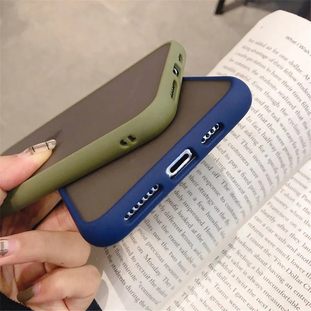 Transparent solid-colour shockproof iPhone case showing soft TPU sides and hard PC back, compatible with multiple models.