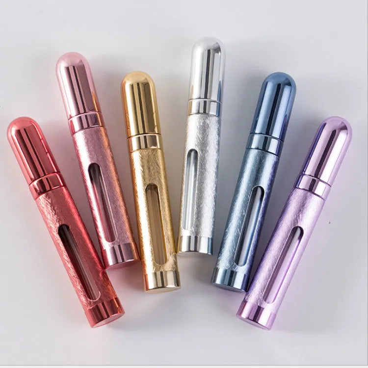 12ml aluminium portable perfume bottle in bullet shape with choice of six colours: blue, pink, red, violet, gold, silver.