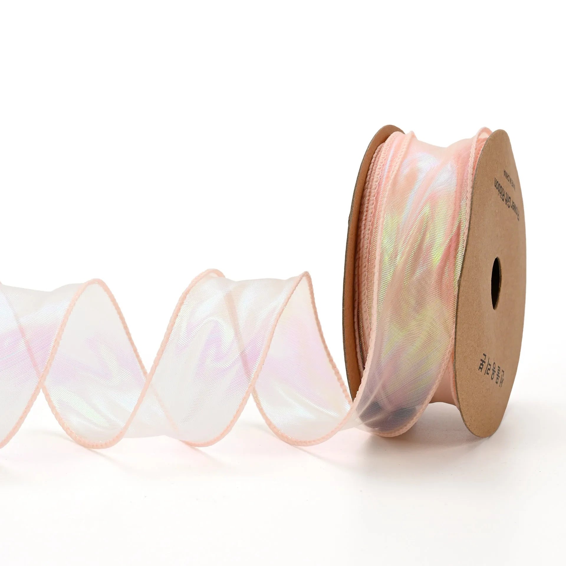 Roll of colourful fishtail yarn mesh decorative ribbon showing wave texture and multiple colour options