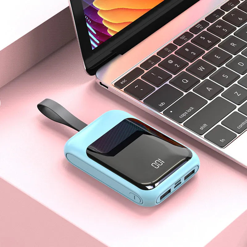 20,000mAh portable power bank showing multiple USB ports and compact dimensions