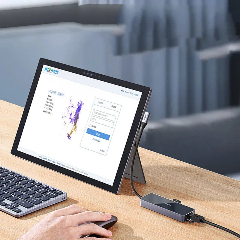 Space Gray 4-in-1 USB 3.0 hub adapter with HDMI, Gigabit Ethernet, and two USB ports on a 0.2m cable