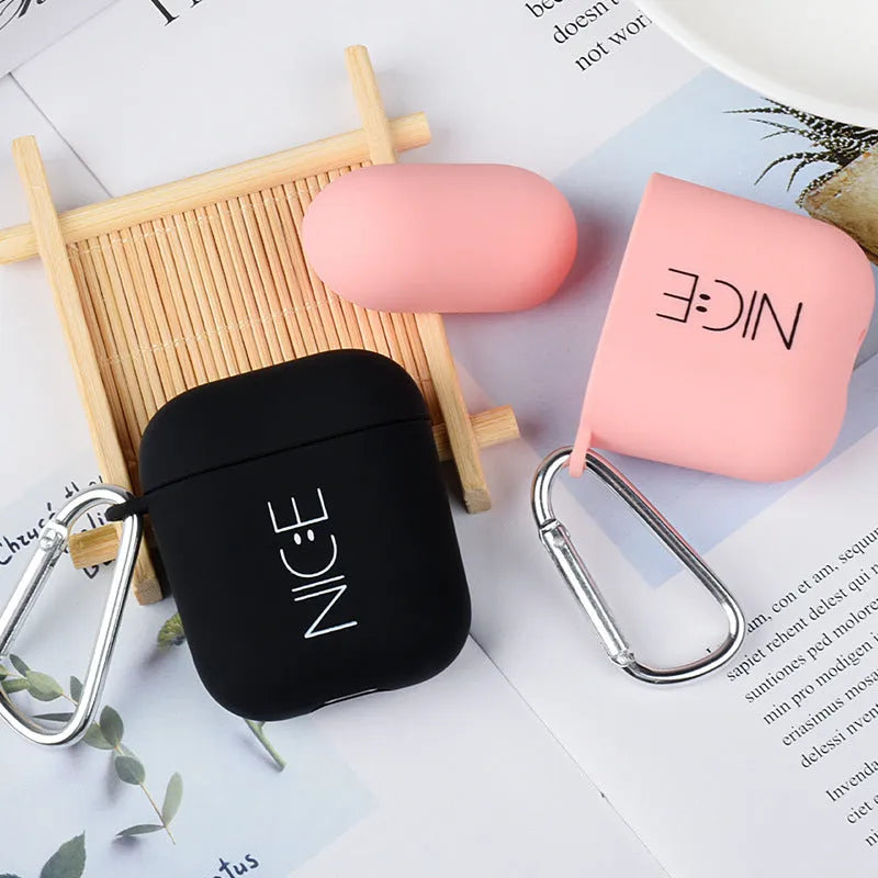 Black and Pink wireless headset cases for Apple AirPods with decorative Flower, Love, Smiley face patterns