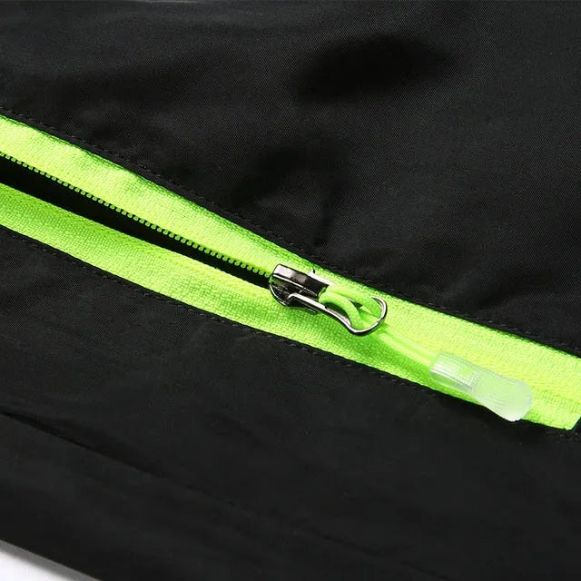 Quick-drying breathable gym running pants in fluorescent green – 100% polyester thin fabric with micro-elasticity, side view on treadmill