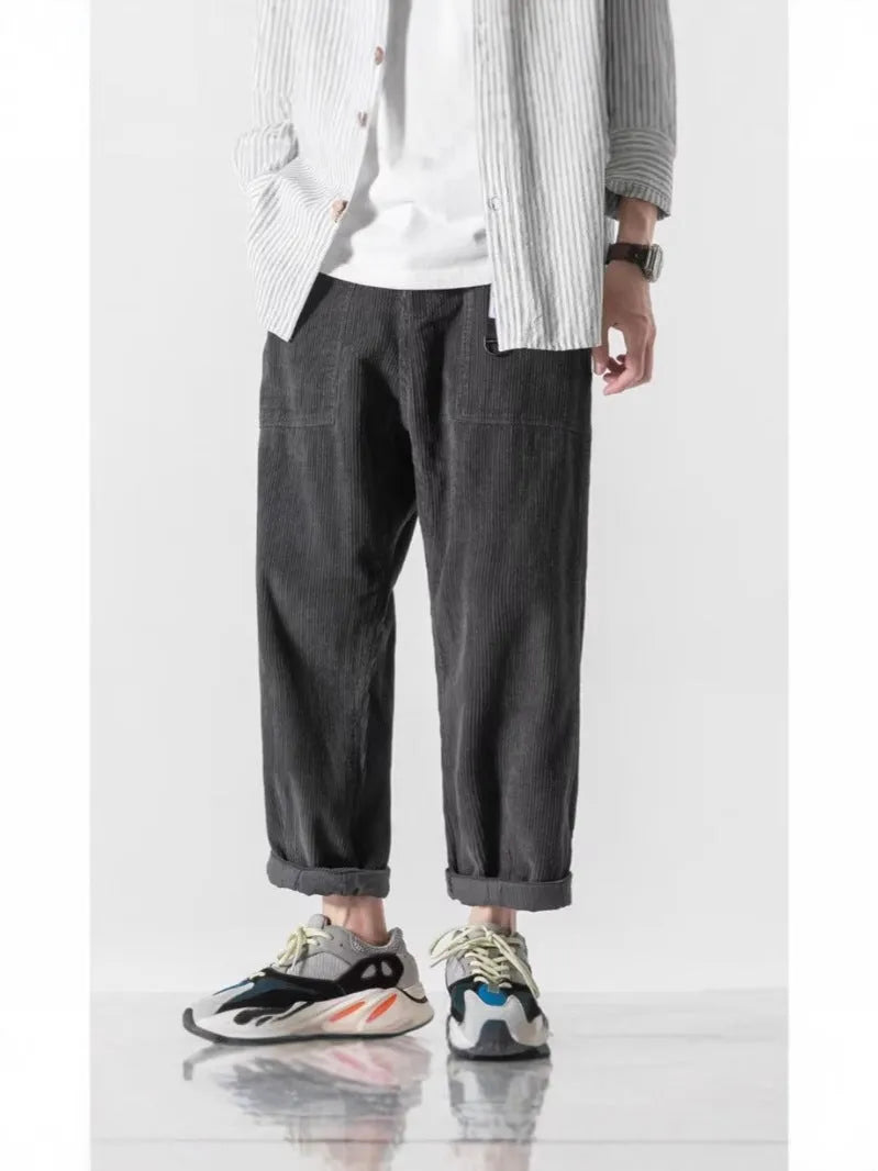 Loose straight tapered trousers in chemical fibre blend fabric, available in multiple sizes and colours