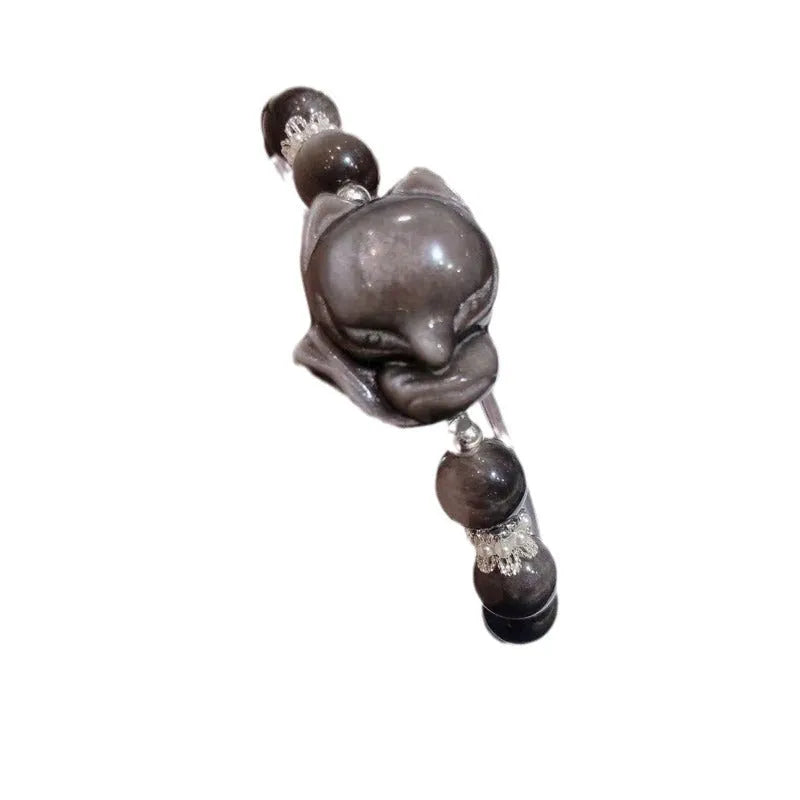 Natural silver stone big head fox bracelet with 8mm obsidian beads on a white background
