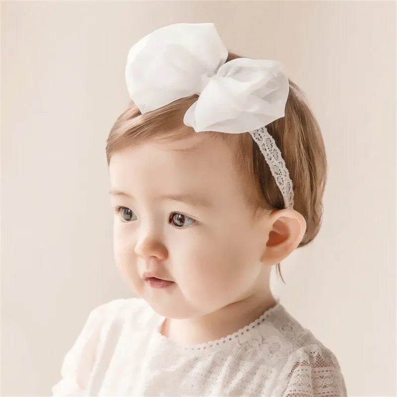Baby girls headband with double bow-knot and lace floral design in soft cloth material