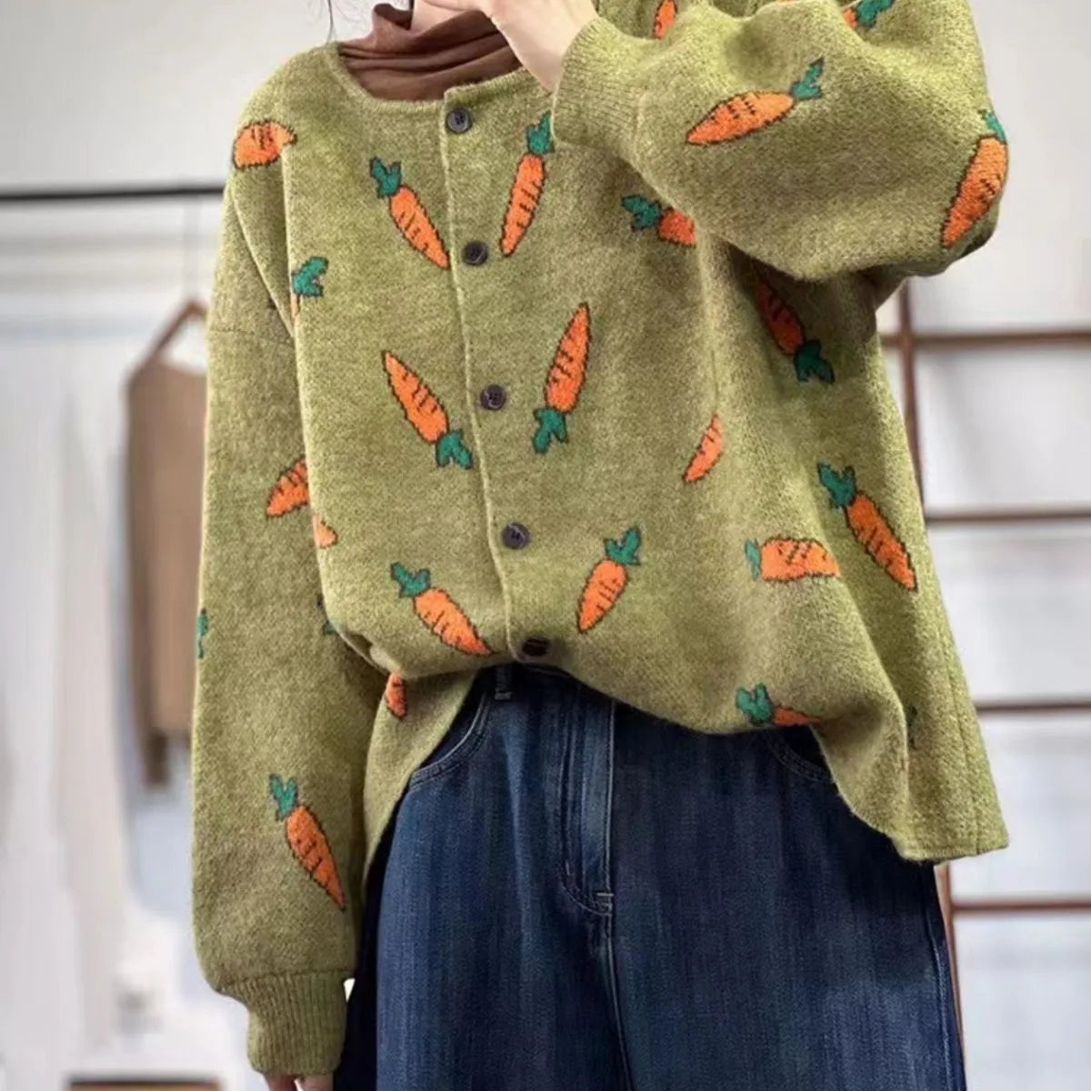 Round neck cardigan sweater with artistic colour print contrast and loose fit design