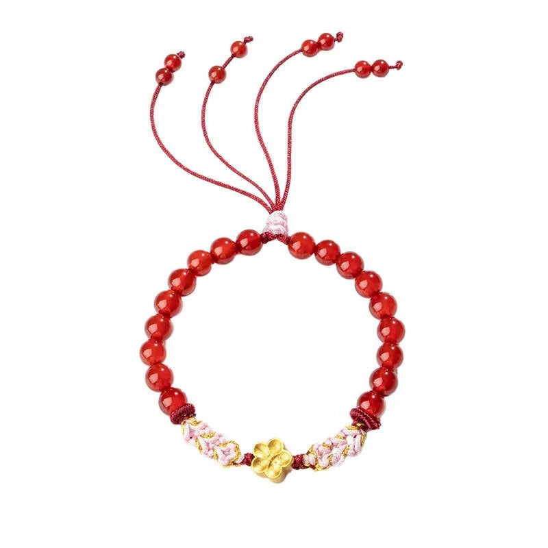 Hand-woven red rope bracelet with diamond-shaped crystal peach blossom elements in Chinese style