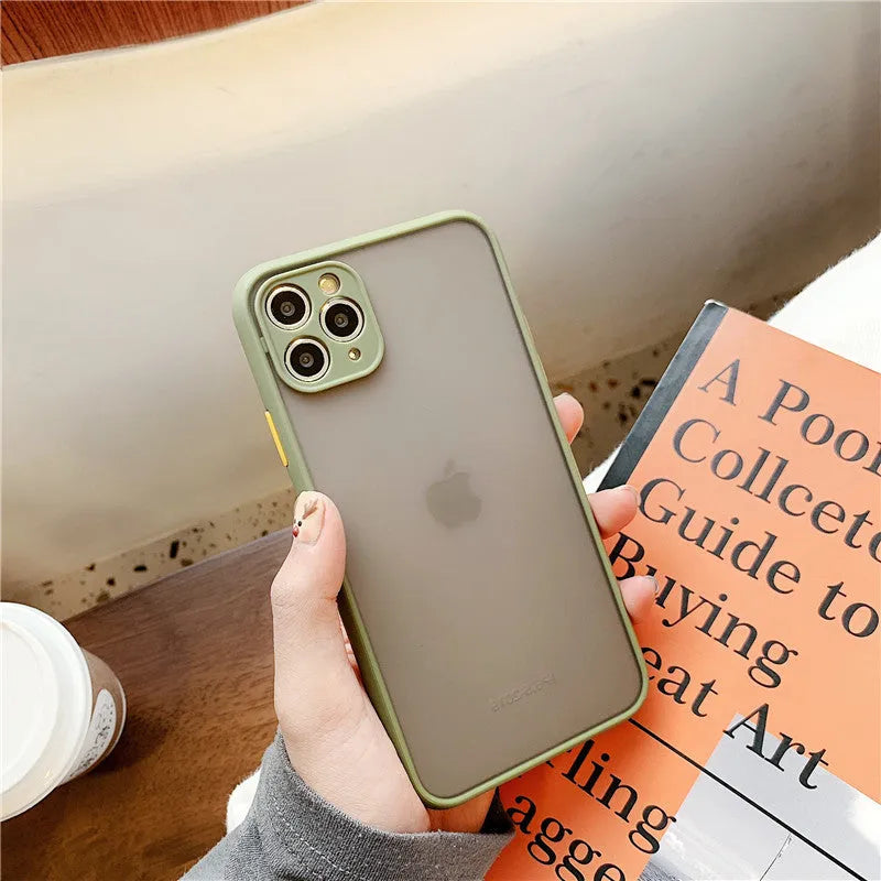 Transparent solid-colour shockproof iPhone case showing soft TPU sides and hard PC back, compatible with multiple models.