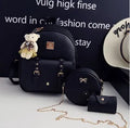 Floral design women's 3-piece PU leather bag set showing backpack, shoulder bag, and card purse.