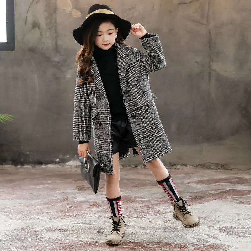 Girls grey and white houndstooth plaid coat with suit collar and long sleeves.