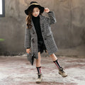 Girls grey and white houndstooth plaid coat with suit collar and long sleeves.