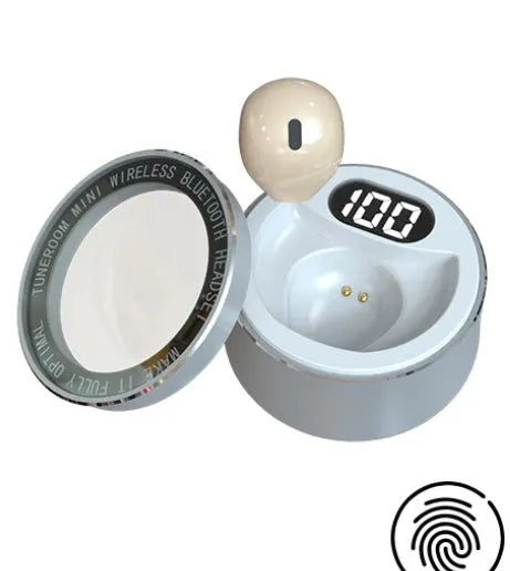 Close-up of invisible 9mm skin-coloured Bluetooth earphone sitting discreetly in an ear.