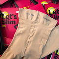 Beige and black stovepipe shapewear socks for hip and abdomen lifting support