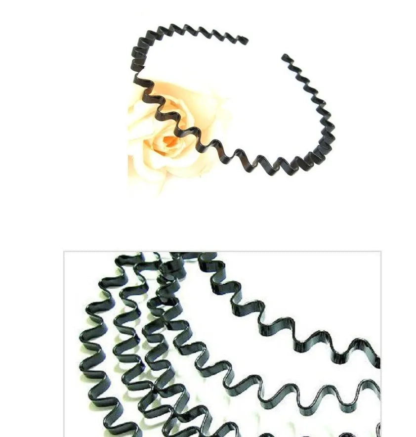 Unisex wavy black alloy headband hair ring on a flat surface