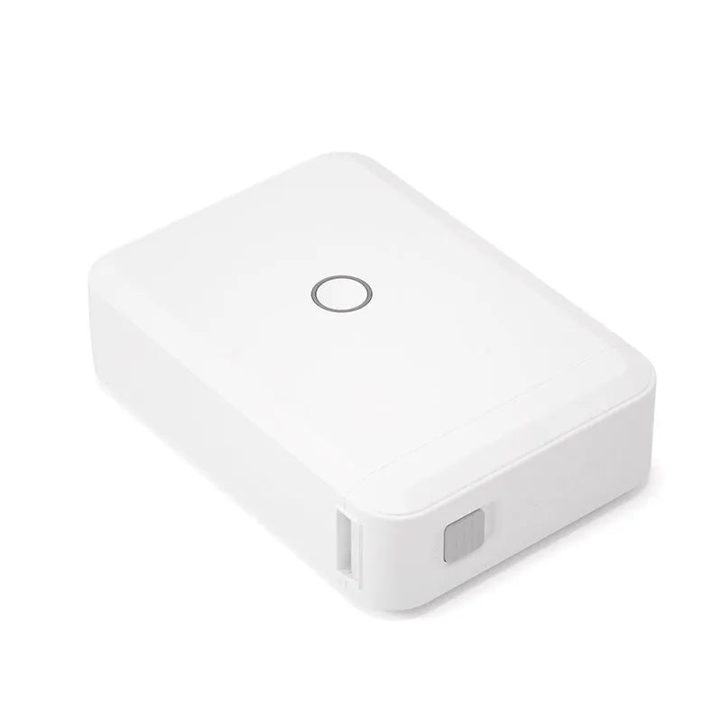 D110 thermal label printer in white with half-inch label roll, front view showing compact size and paper slot