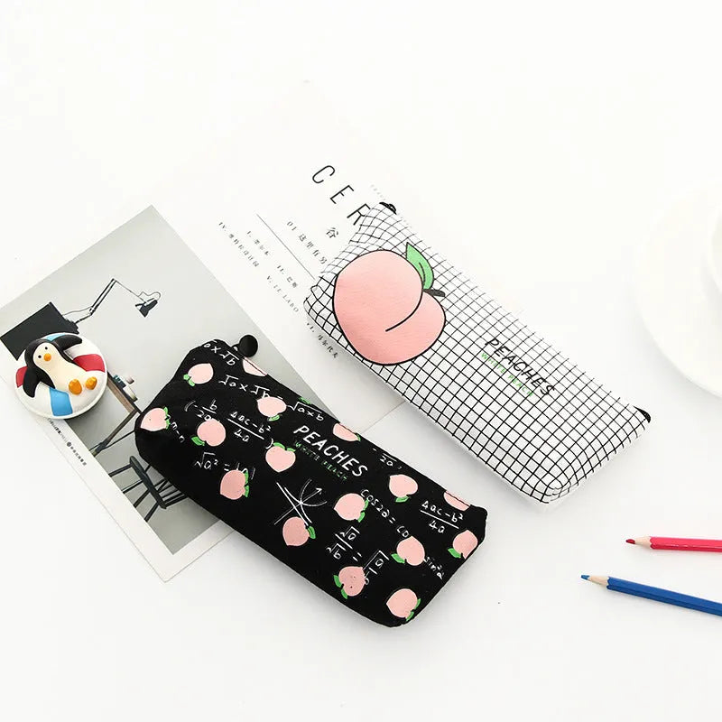Rectangular canvas pen bag in peach print pattern, 20 by 8.5 centimetres, on a flat surface.