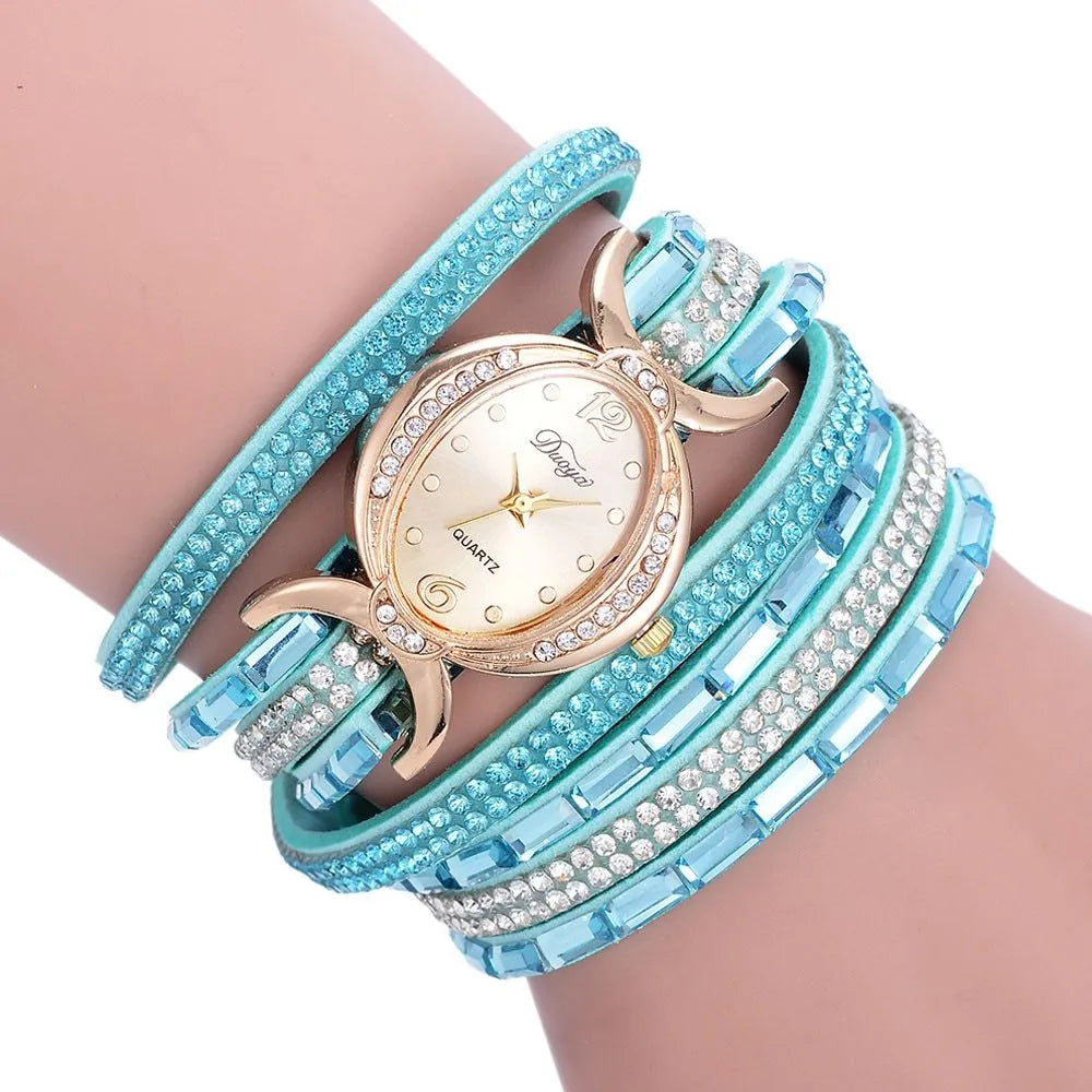 New casual rhinestone watch for women with round stainless steel case, leather band, and analog quartz movement