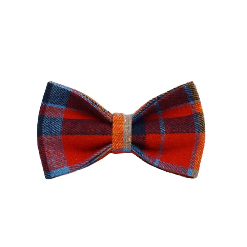 Four-piece dog fashion set showing collar, leash, bow tie and vest in coordinated cloth material
