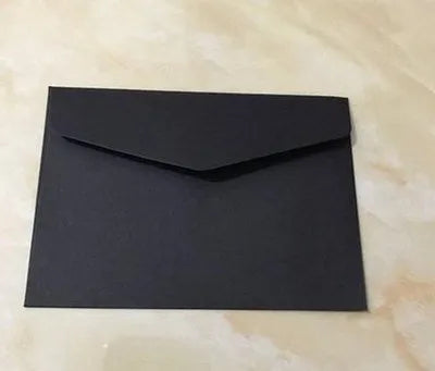 Mini coloured envelopes in assorted colours showing 11.5cm by 8cm dimensions and western-style flap