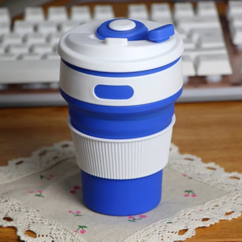 Green collapsible silicone travel mug shown expanded and folded to 6cm height