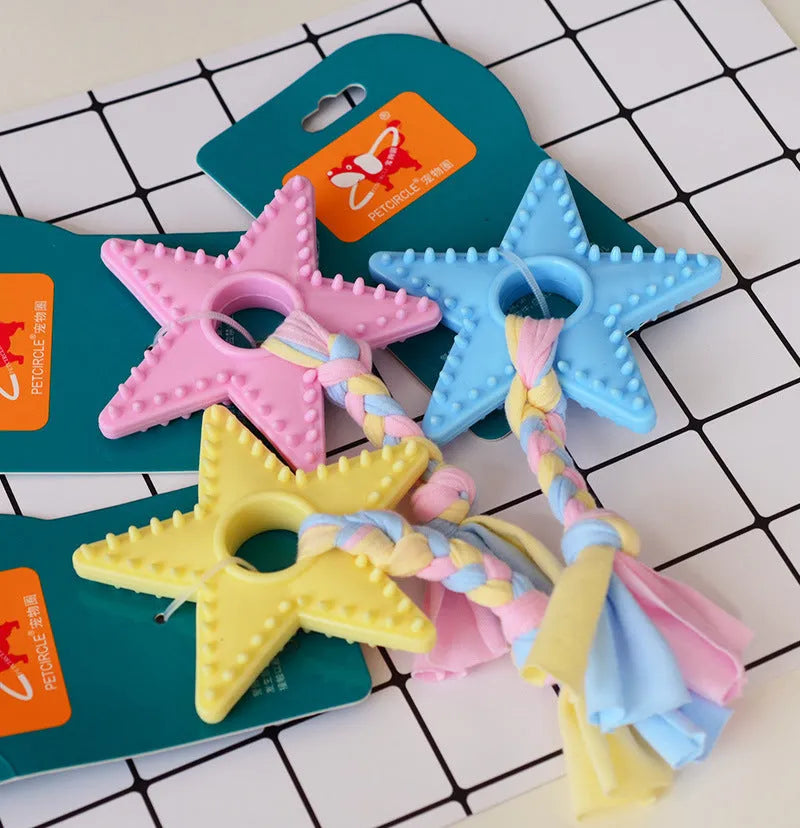 Non-toxic rubber dog chew toy in star shape with textured surface for teeth cleaning