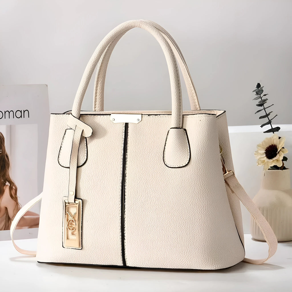 Women's large capacity shoulder bag in soft PU leather with adjustable strap and multiple colour options