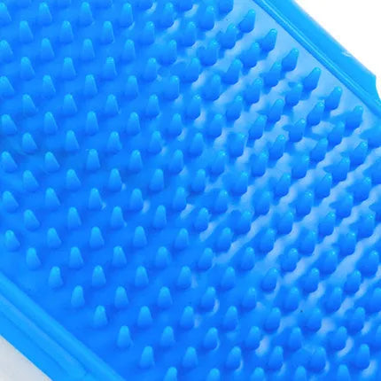 Elliptical hand-shaped plastic dog bath brush in blue, 120x90x20mm, for general pet grooming