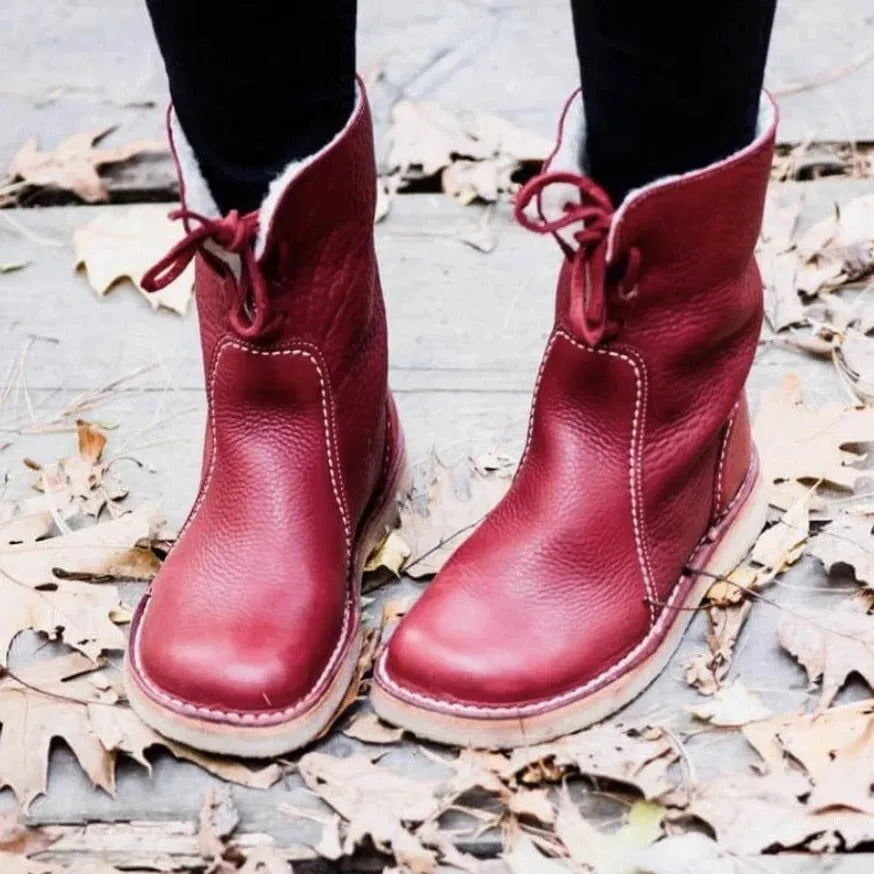 Women's winter snow boots with lace-up design, cotton lining, and non-slip rubber sole in a choice of colours