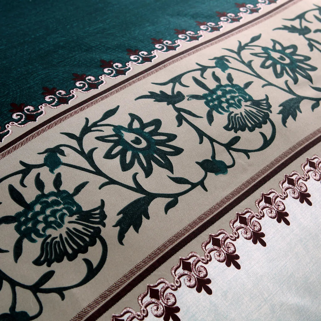 Plain weave polyester duvet cover set in solid colour or floral pattern on a bed