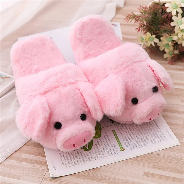 Pink pig plush floor slippers with soft short plush material and PP cotton filling.