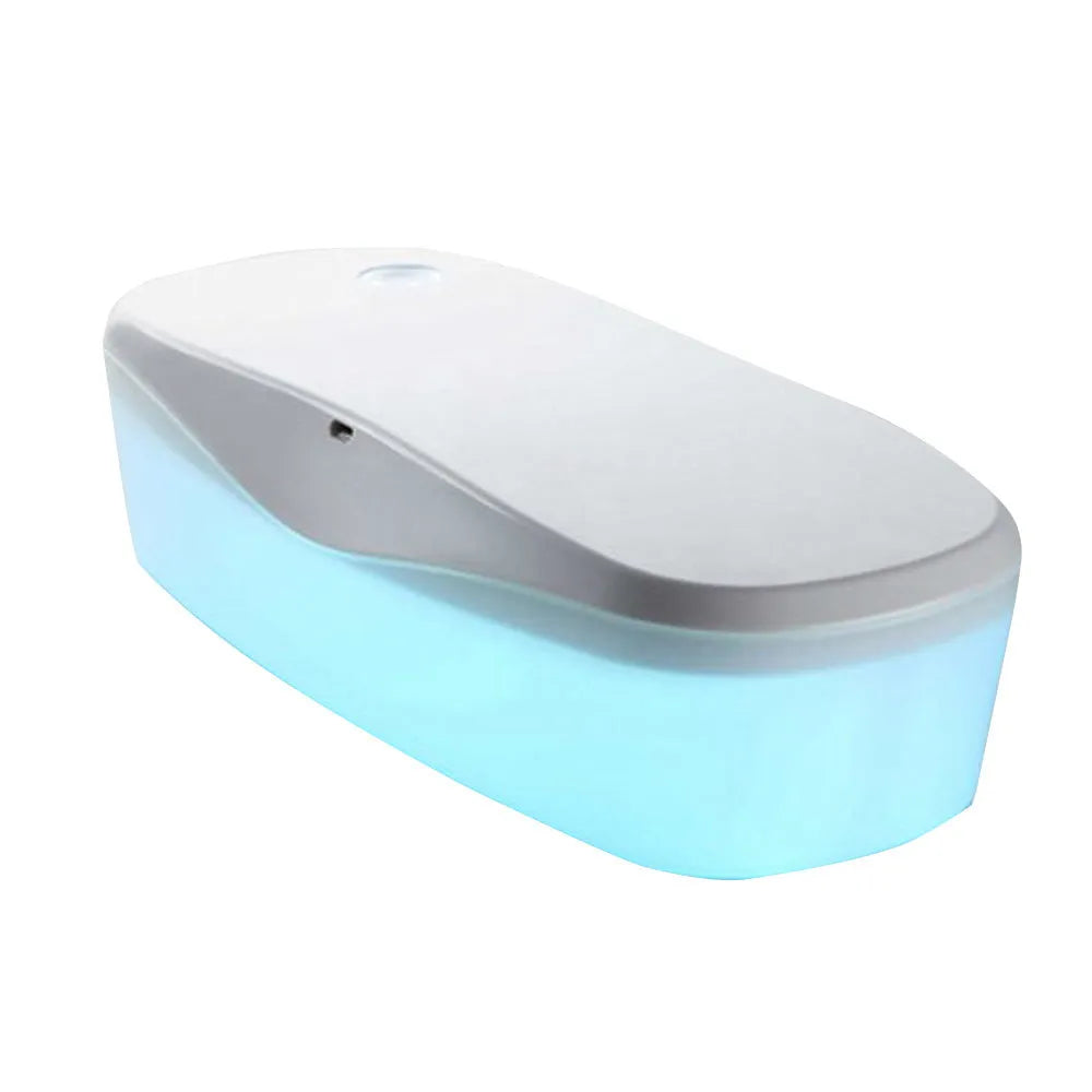 Compact white DORR UV disinfection box with USB cable for sanitising phones and small items.