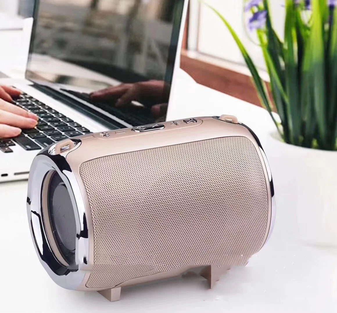 Portable metal subwoofer with 2.1 channel audio, battery power, Bluetooth, USB and FM inputs in black blue golden red silver colours