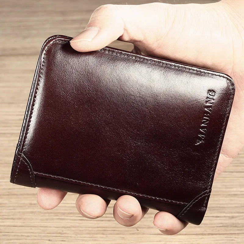 Men's black leather bi-fold wallet open to show card slots, banknote compartment, and coin pocket.