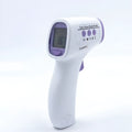 White handheld digital thermometer for non-contact temperature measurement.