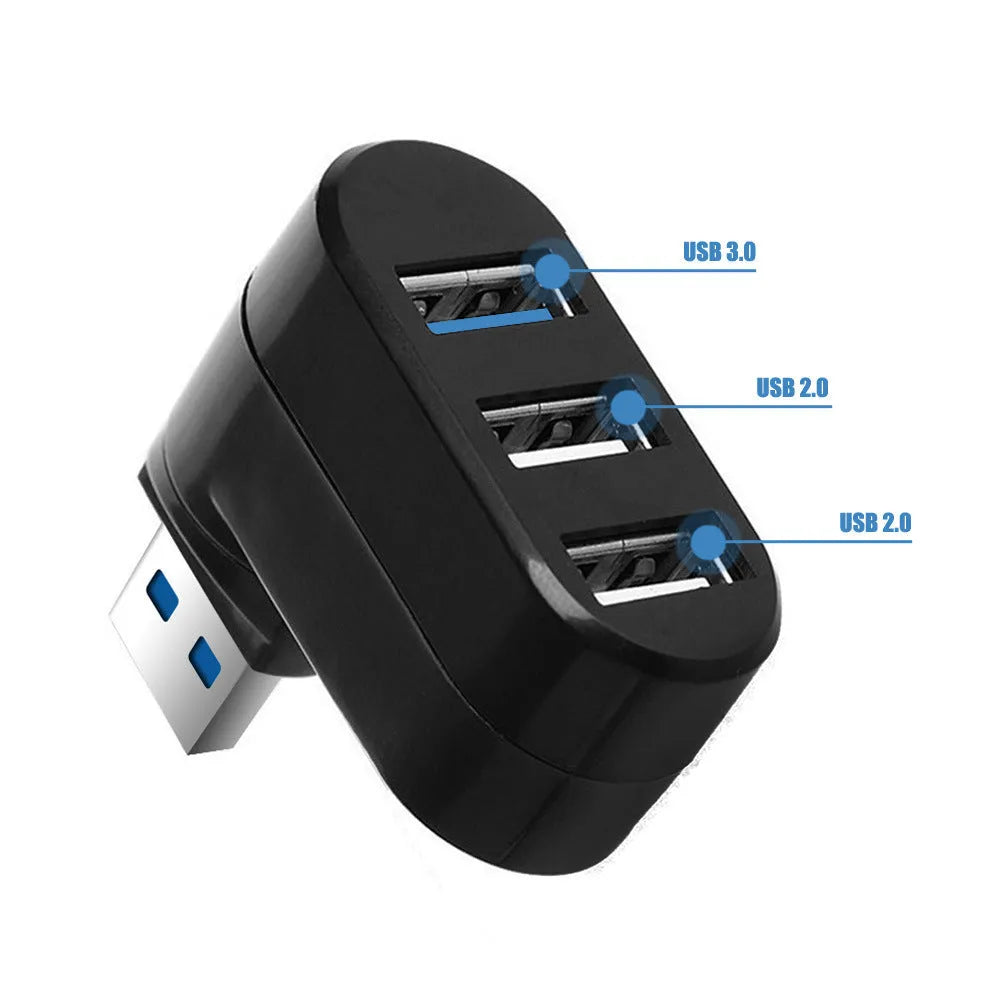 Black USB rotary splitter hub with four USB ports on a white desktop