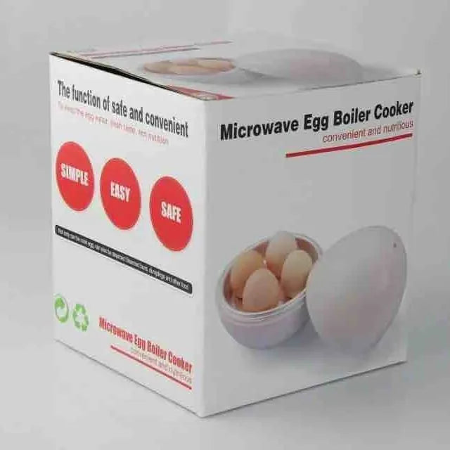White microwave egg cooker with capacity for 4 eggs on kitchen counter