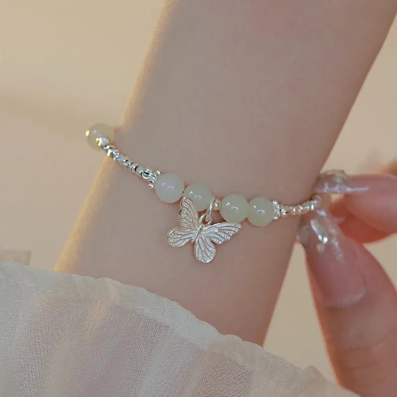 Silver butterfly necklace and bracelet set for women with electroplated copper construction
